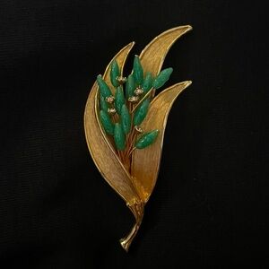 Vintage golden brooch with crystals and jade color beads statement